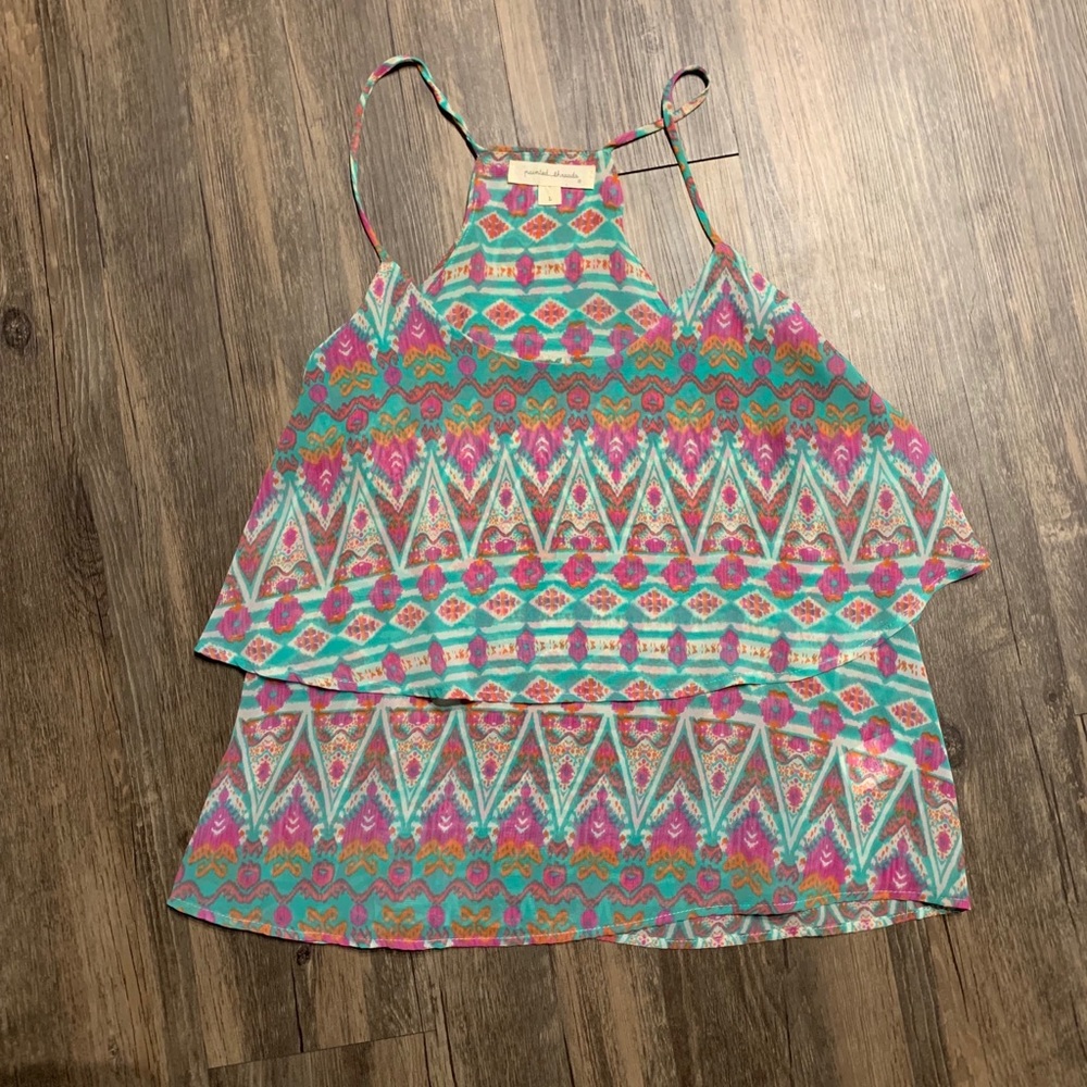 Razor back ruffle tank